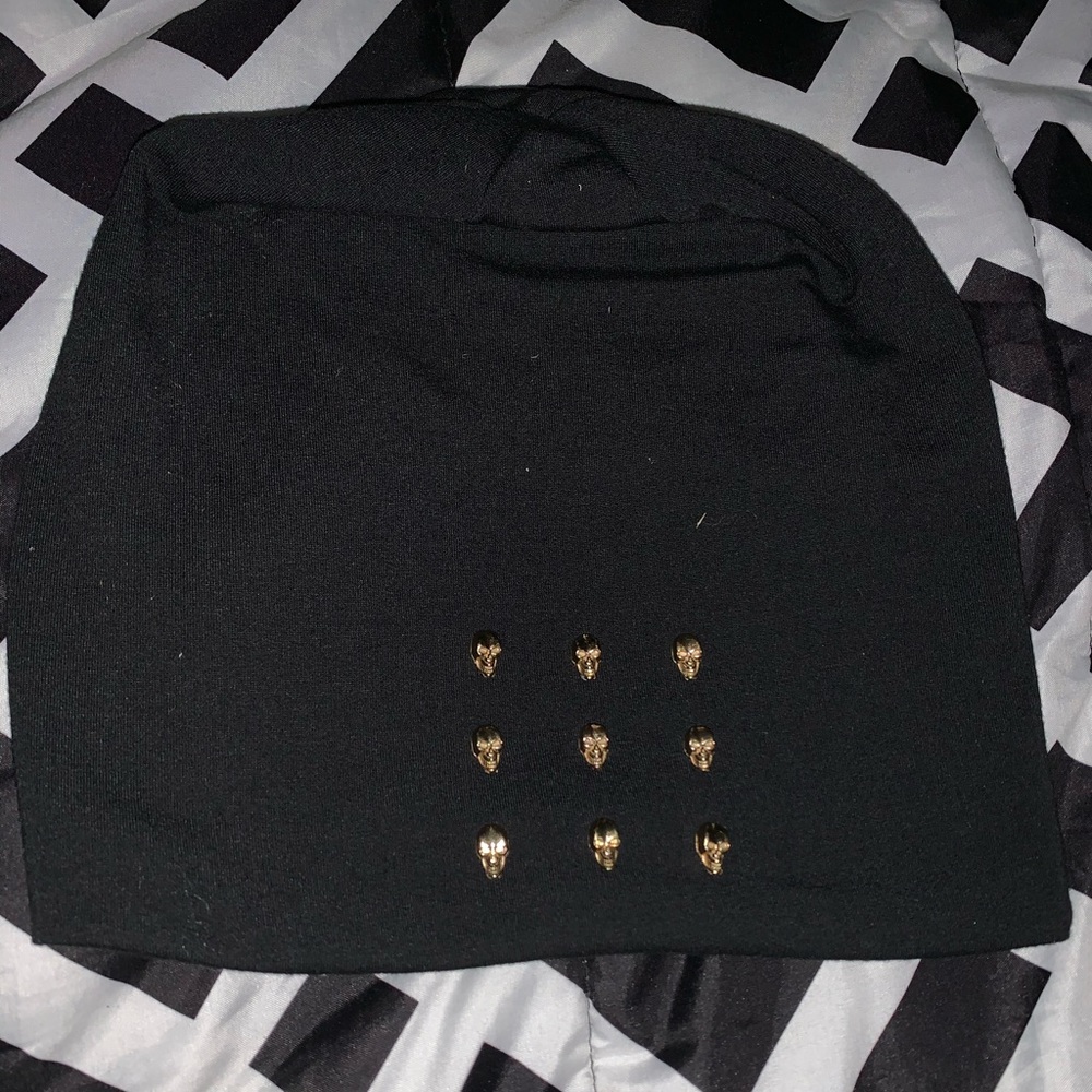 Black beanie hat with skull detailing
